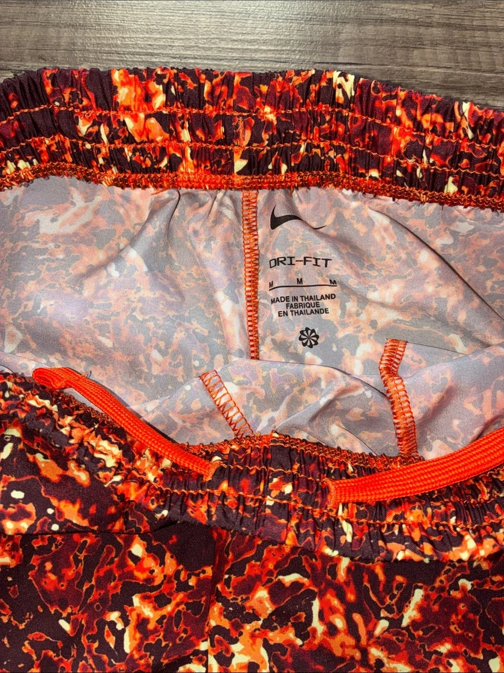 Boys Nike Red and Orange Marbled Athletic Shorts